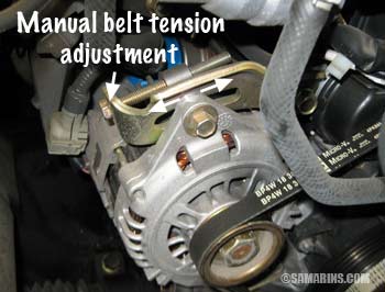 Manual belt tension adjustment