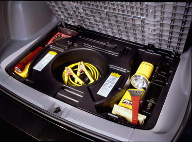 Storage under the trunk cover