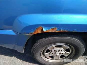 Rust damage on the rear fender
