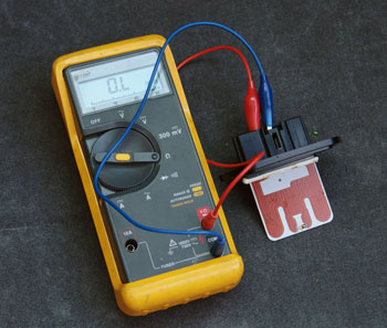 Testing a blower motor resistor with an ohm-meter