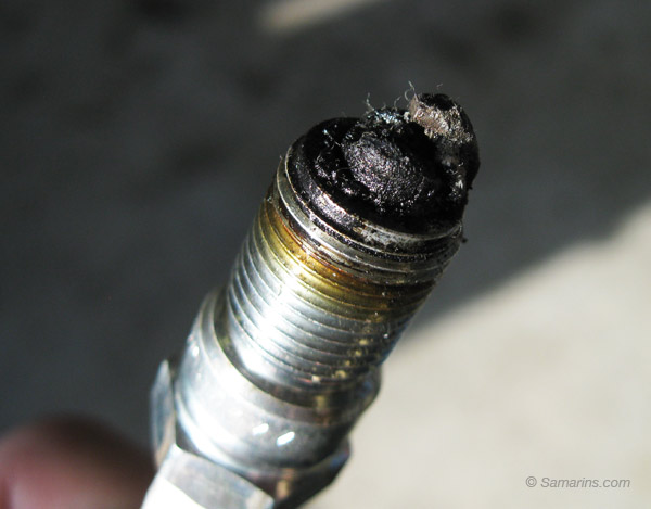 fouled spark plug fouled spark plug