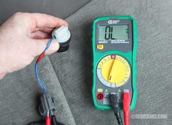 Testing a washer fluid sensor