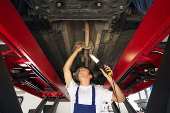 Mechanic working on a vehicle